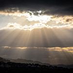 Sunrays through the clouds by Groman123 sun through the clouds photo