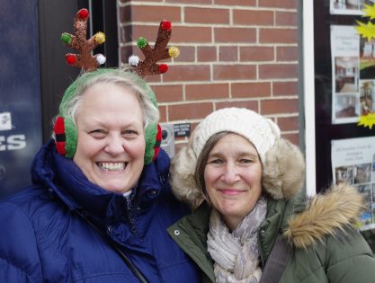 Pam Yenco of Farmington and Bev Yoon of Wilton were just two of hundreds of parade watchers on Chester Greenwood Day to be wearing ear muffs of one style or another.
